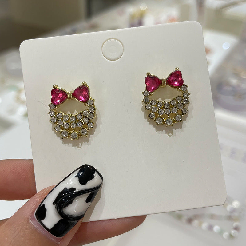 Wholesale Bow Oil Dripping Diamond Snowflake Earrings